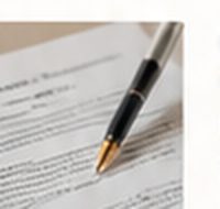 A pen resting on a signed document